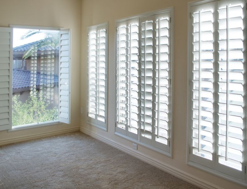 Custom Shutters with Decorative Hardware